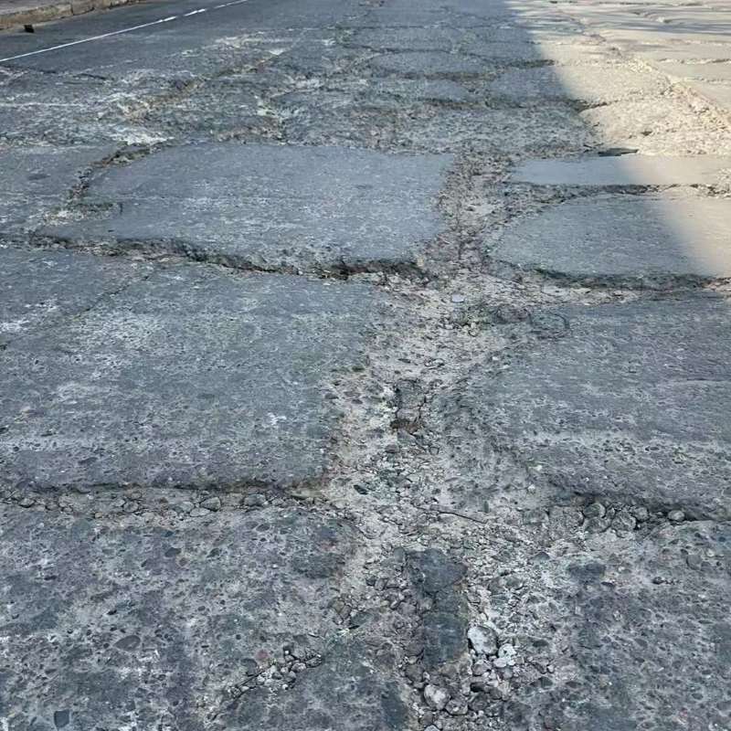 山西路面起砂露石子修补料
